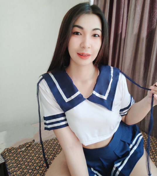 Masseuse Jessie in her sexy school costume